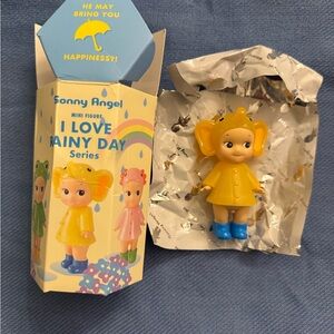 Sonny Angel Rainy Day Figure in Yellow and Blue